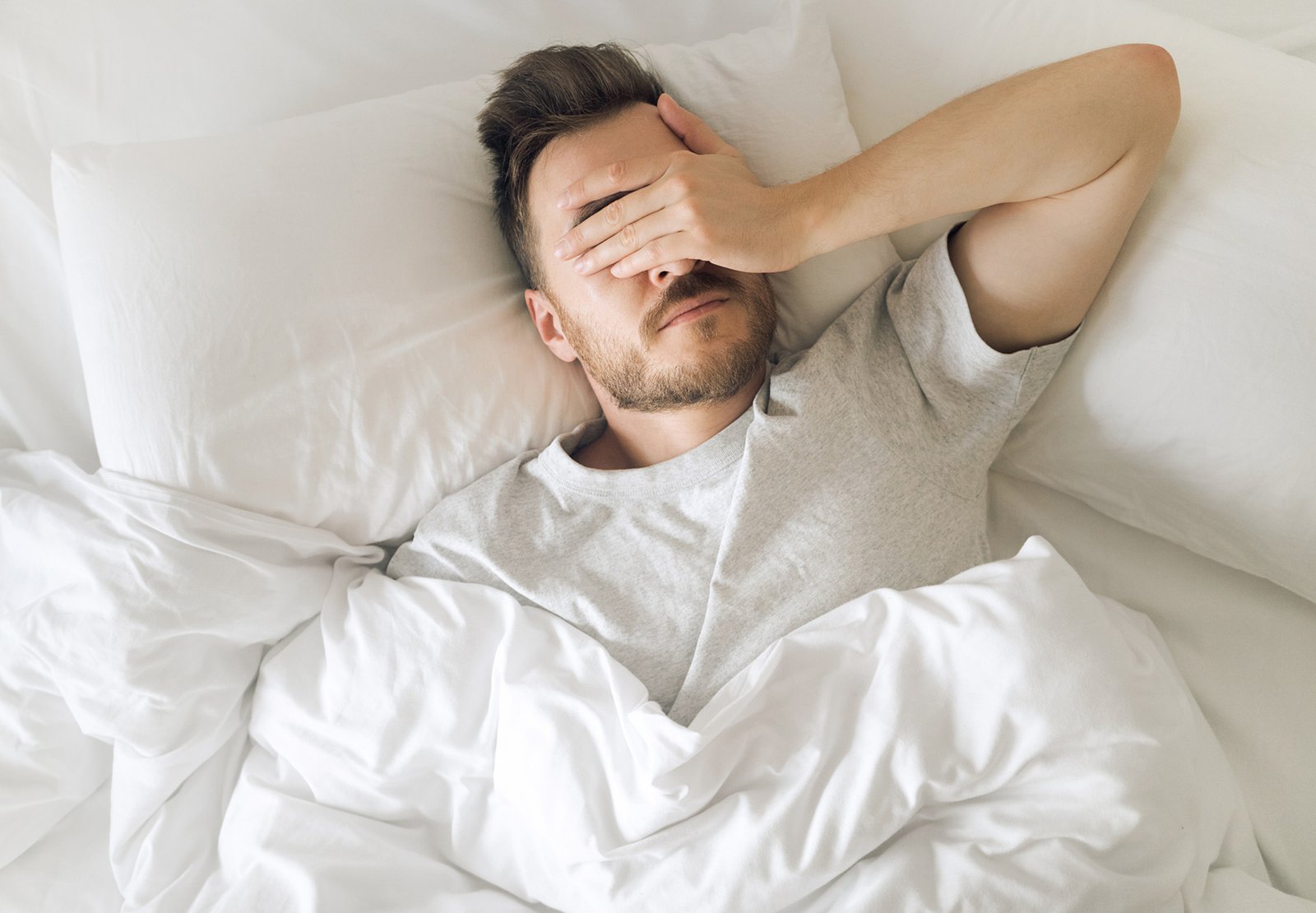 covering face in bed