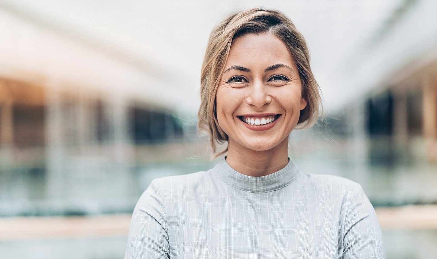 smiling with blurred background